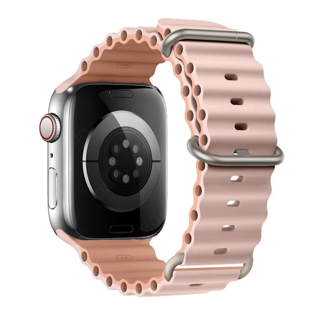 Apple Watch with a pink silicone strap, waterproof and breathable, ideal for workouts and water sports.
