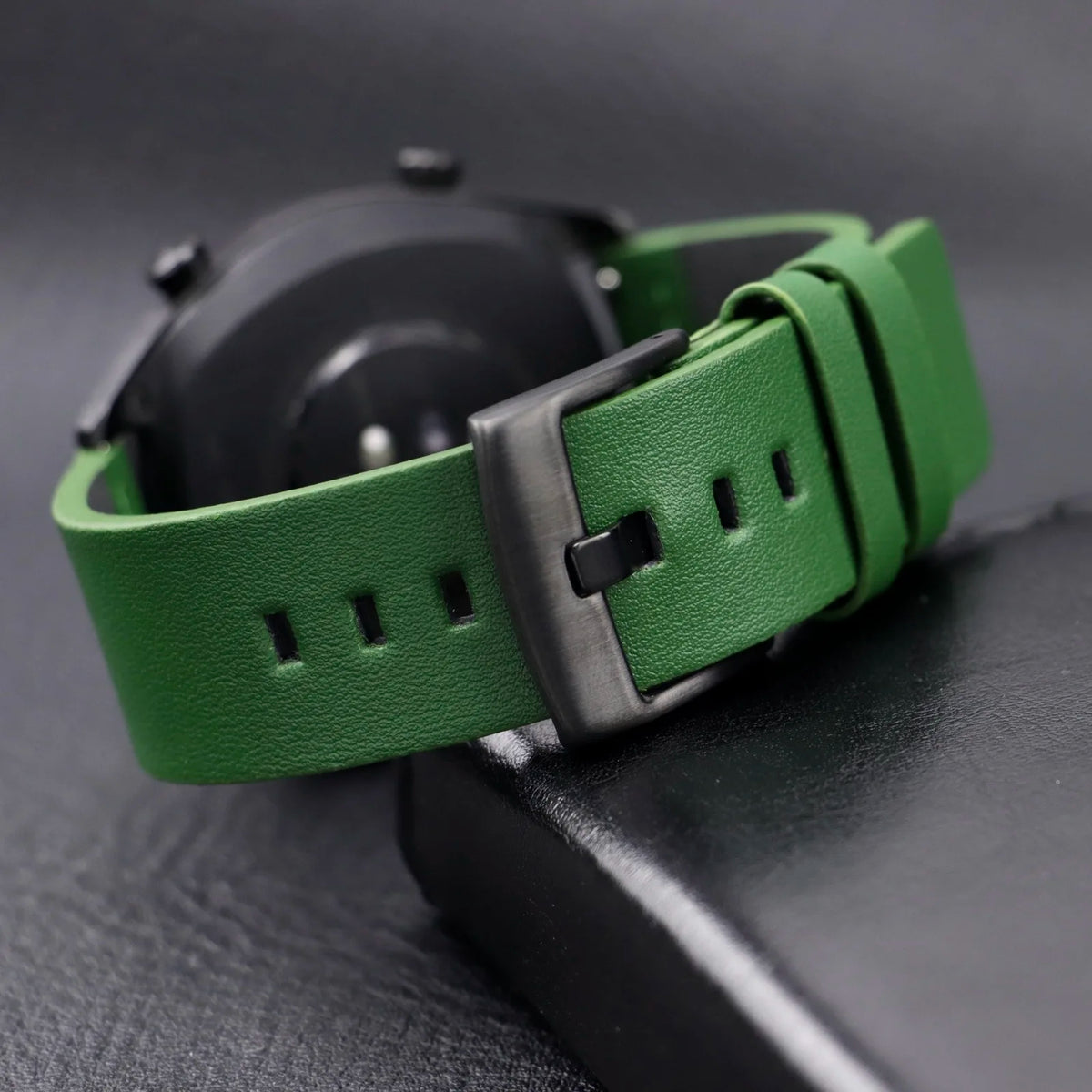 Motorola Moto Leather Band with Square Adjustment Holes — Green strap with black buckle shown on a watch