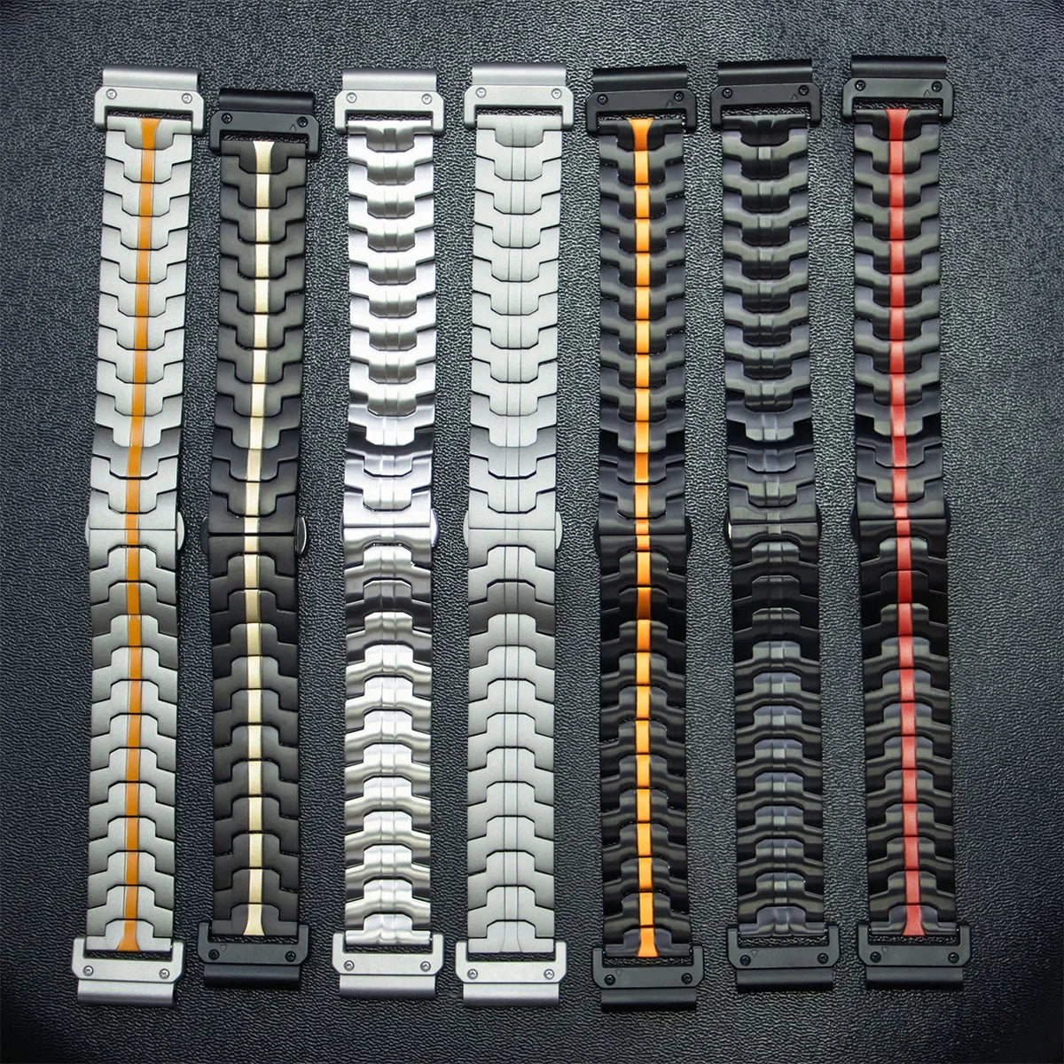 Variety of Garmin replacement straps showcasing elegant stainless steel and vibrant colors for enhanced smartwatch style.