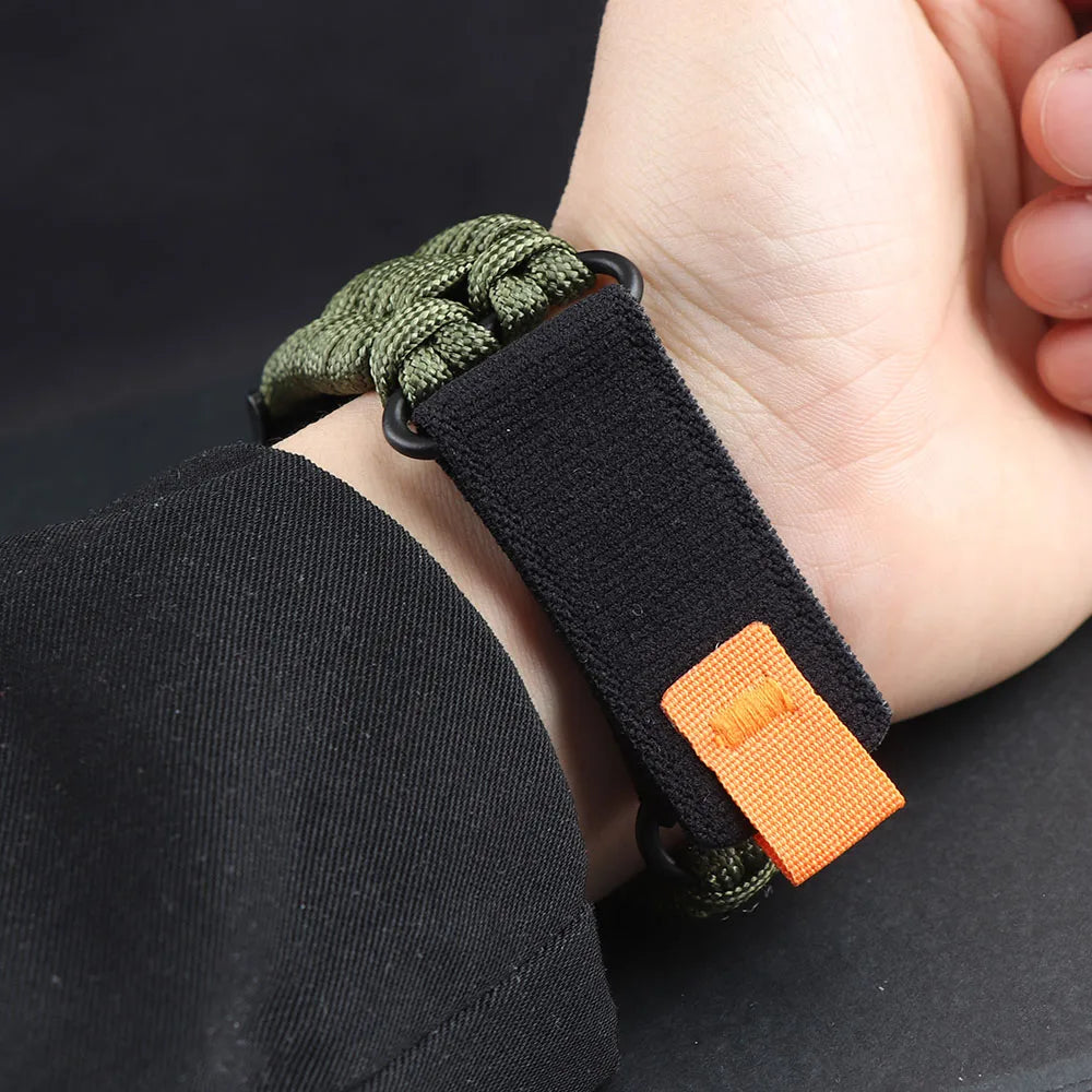Samsung Galaxy Nylon Umbrella Rope Watch Band For Watch8/Watch8 Classic/Watch9/Ultra/Ultra2 on wrist, featuring olive-green woven nylon design.