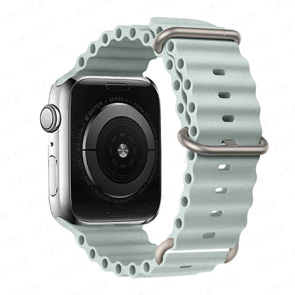 Apple Watch with a light blue silicone strap, waterproof and breathable, perfect for active lifestyles.