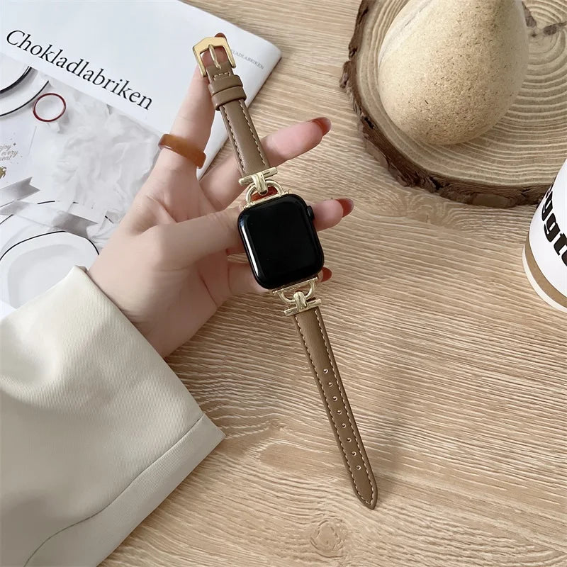 Apple Watch genuine leather strap in hand, showcasing its classic durable design and stylish elegance.