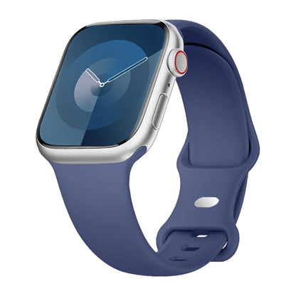 Apple Watch with soft flexible waterproof silicone strap in navy blue, perfect for active lifestyles and everyday wear.
