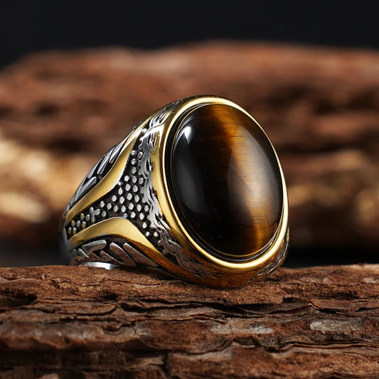 Elliptical tiger's eye ring, 316L stainless steel with gold-tone accents