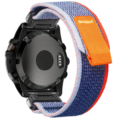 Garmin rugged woven nylon sport band in blue with orange accents, designed for durability and comfort for smartwatches.