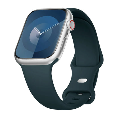 Apple Watch with dark green silicone strap, showcasing its waterproof and flexible design for comfort and style.