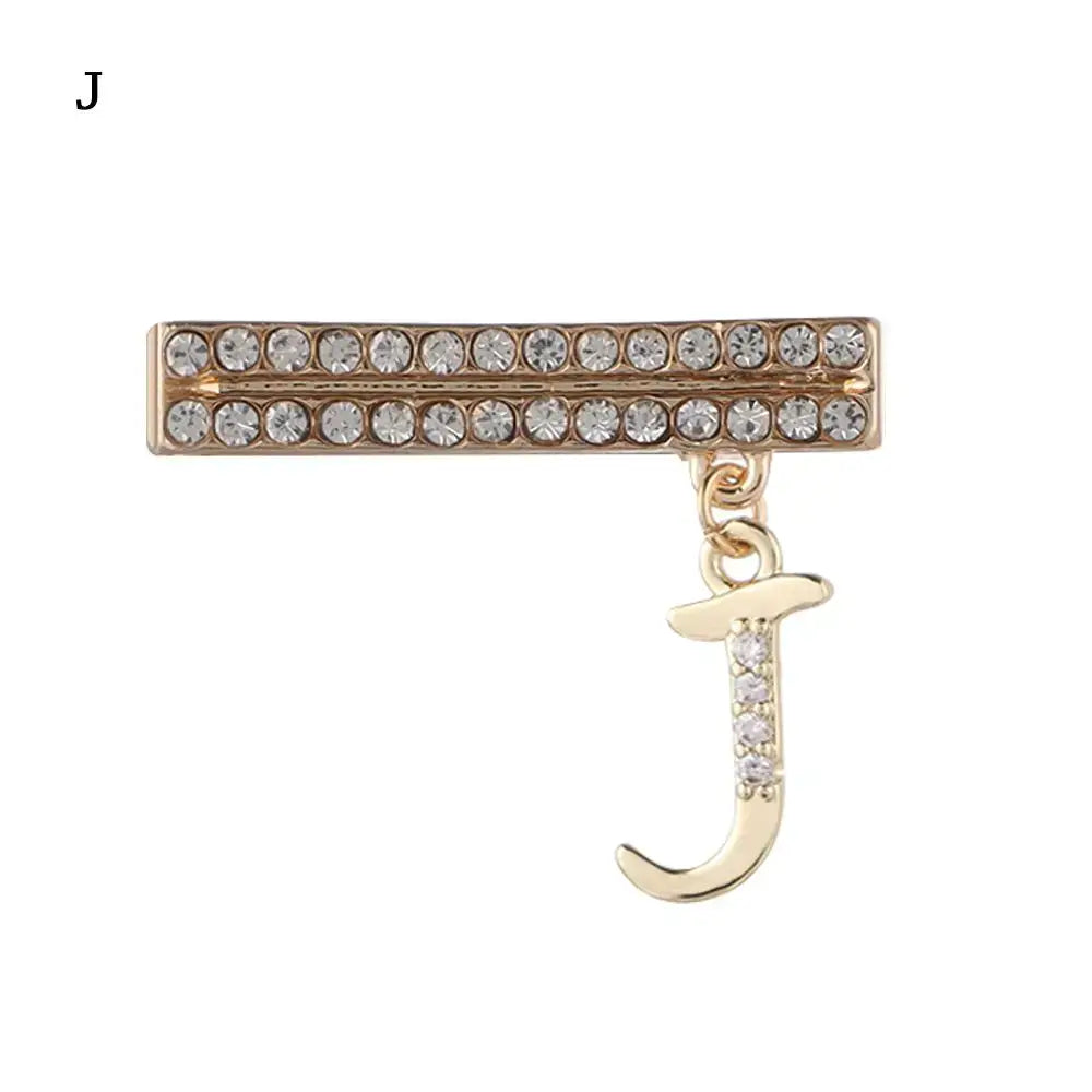 Decorative gold letter 'J' charm with rhinestones for Apple Watch band, adding luxury and style.
