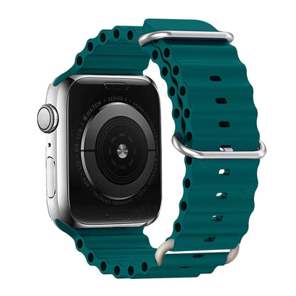 Apple Watch with a teal silicone strap, waterproof and breathable for active lifestyles.