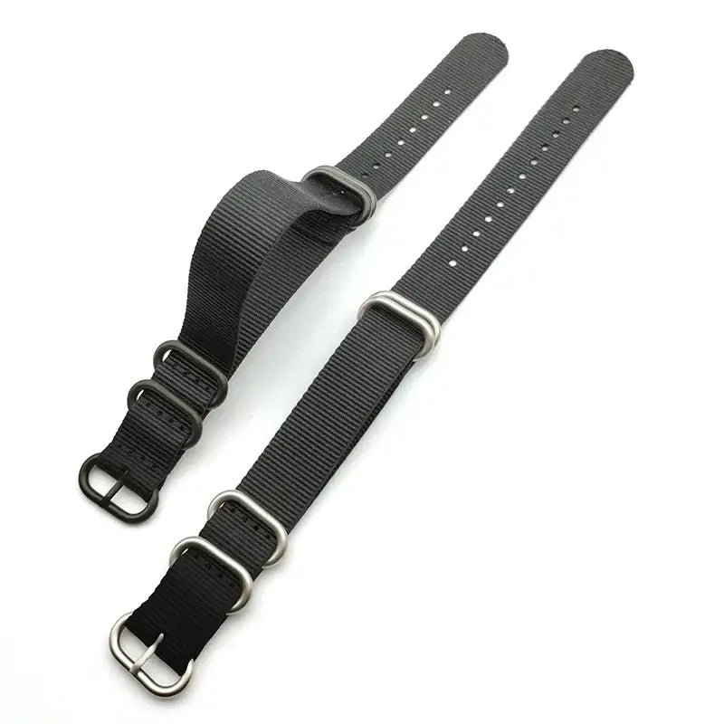 Black nylon straps with black and silver-tone hardware