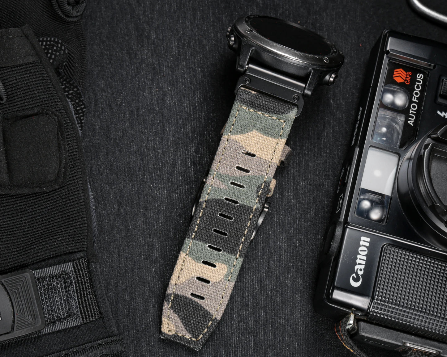 Garmin rugged nylon sport band in camo pattern, durable strap for smartwatch with quickfit closure.