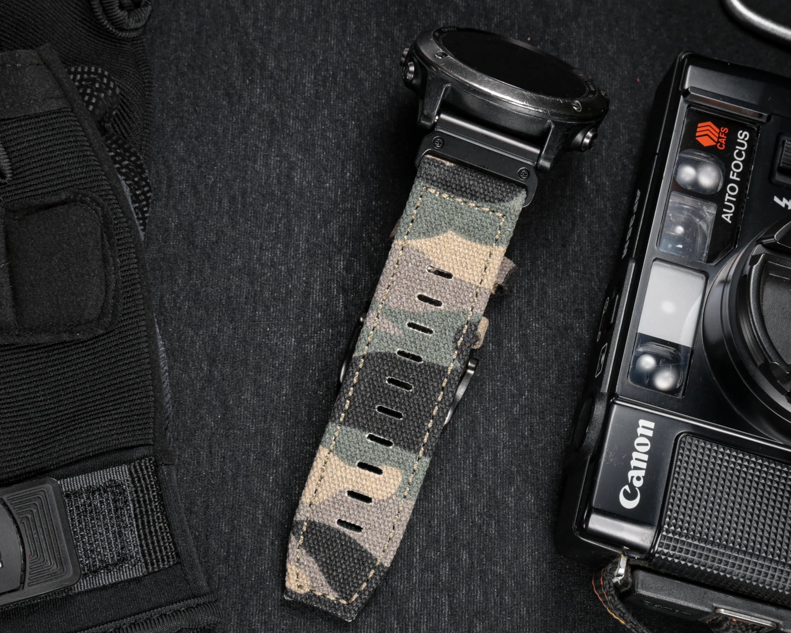 Garmin rugged nylon sport band in camo pattern, durable strap for smartwatch with quickfit closure.