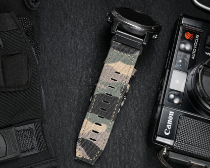 Garmin rugged nylon sport band in camo pattern, durable strap for smartwatch with quickfit closure.