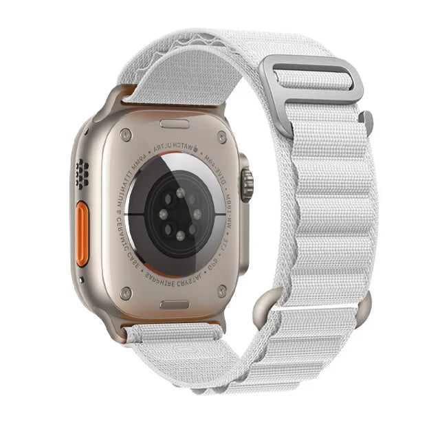 Apple Watch with Rugged Alpine Loop nylon strap, showcasing its durability and adjustable fit for outdoor activities.