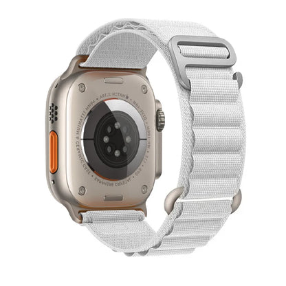 Apple Watch with Rugged Alpine Loop nylon strap, showcasing its durability and adjustable fit for outdoor activities.