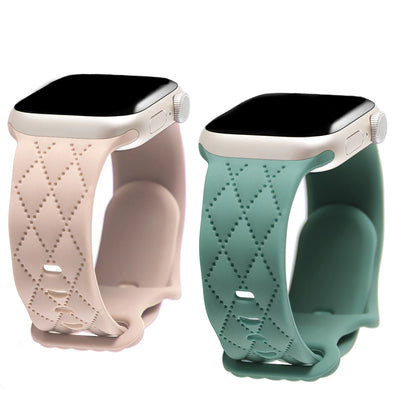 Apple Watch silicone strap in pink and green, soft, flexible, waterproof design for comfort and style.
