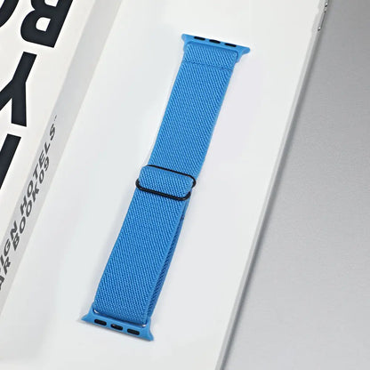 Blue nylon sport loop strap for Apple Watch, breathable and comfortable for daily wear and workouts.