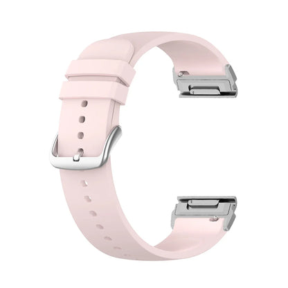 Garmin silicone watch strap in light pink, flexible and durable replacement band for smartwatch with quickfit connectors.