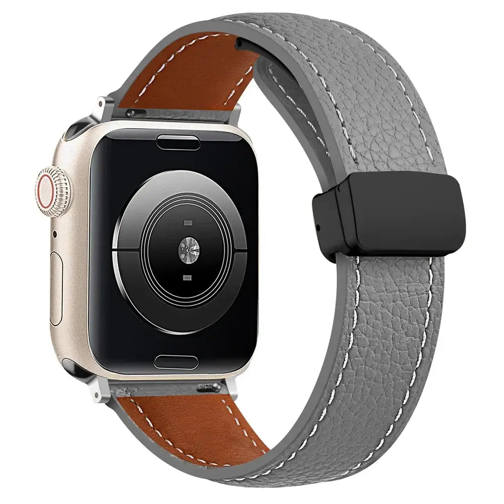 Stitched leather Apple Watch band in Gray, with black folding clasp.