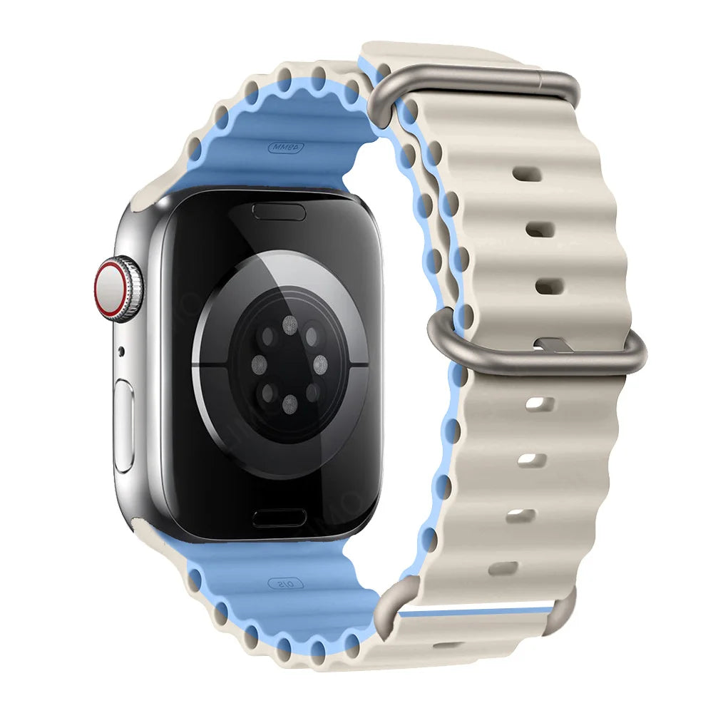 Apple Watch with a two-tone silicone strap in blue and white, waterproof and breathable for active lifestyles.