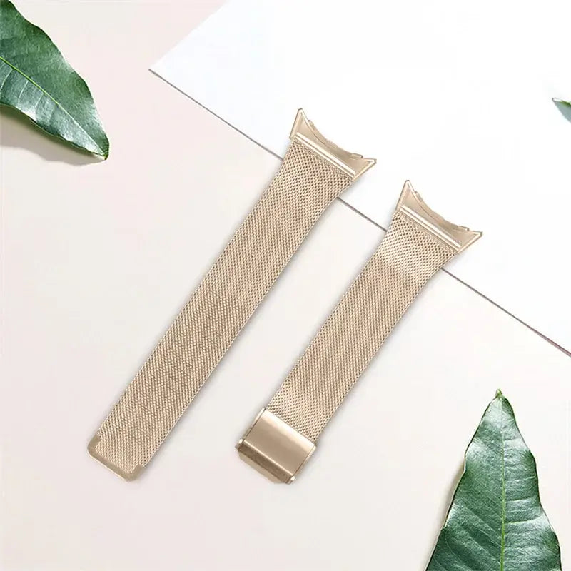 Champagne gold mesh strap laid flat