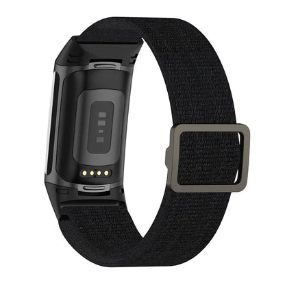 Fitbit Charge 5 Elastic Nylon Loop Band in black, soft and adjustable strap for comfort during workouts.