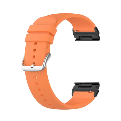 Garmin silicone watch strap in orange, a comfortable and flexible band for smartwatch replacement with quickfit design.