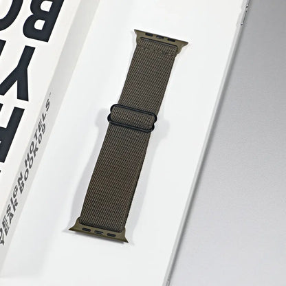 Apple Watch nylon sport loop strap in olive color, featuring breathable fabric for comfort and versatile styling.