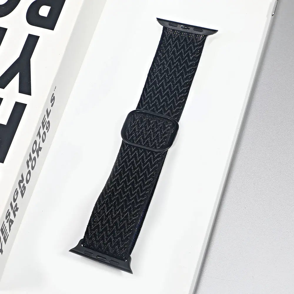 Black nylon sport loop strap for Apple Watch, breathable and comfortable for daily wear and workouts.