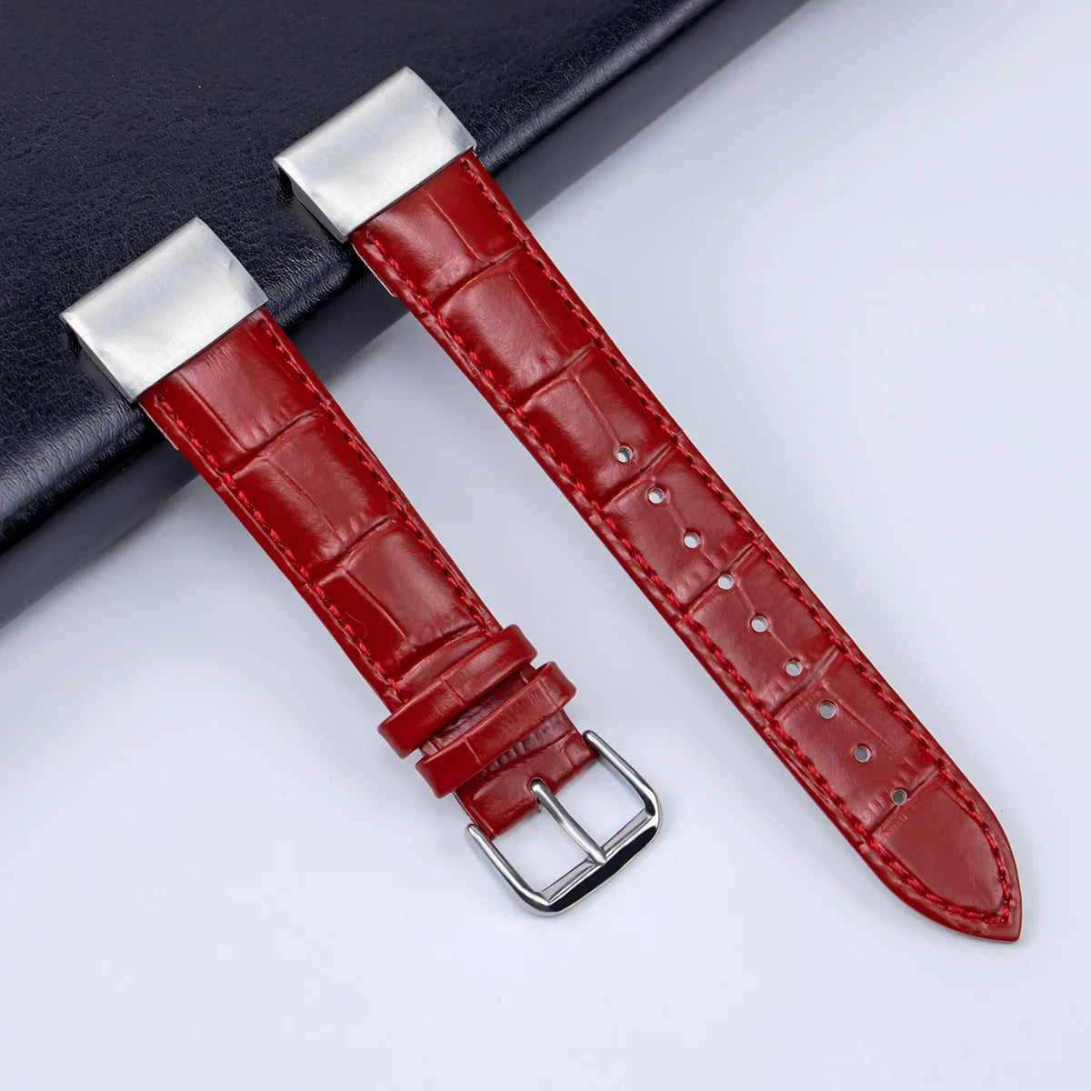 Red leather strap for Garmin smartwatch, premium replacement band with stainless steel buckle.