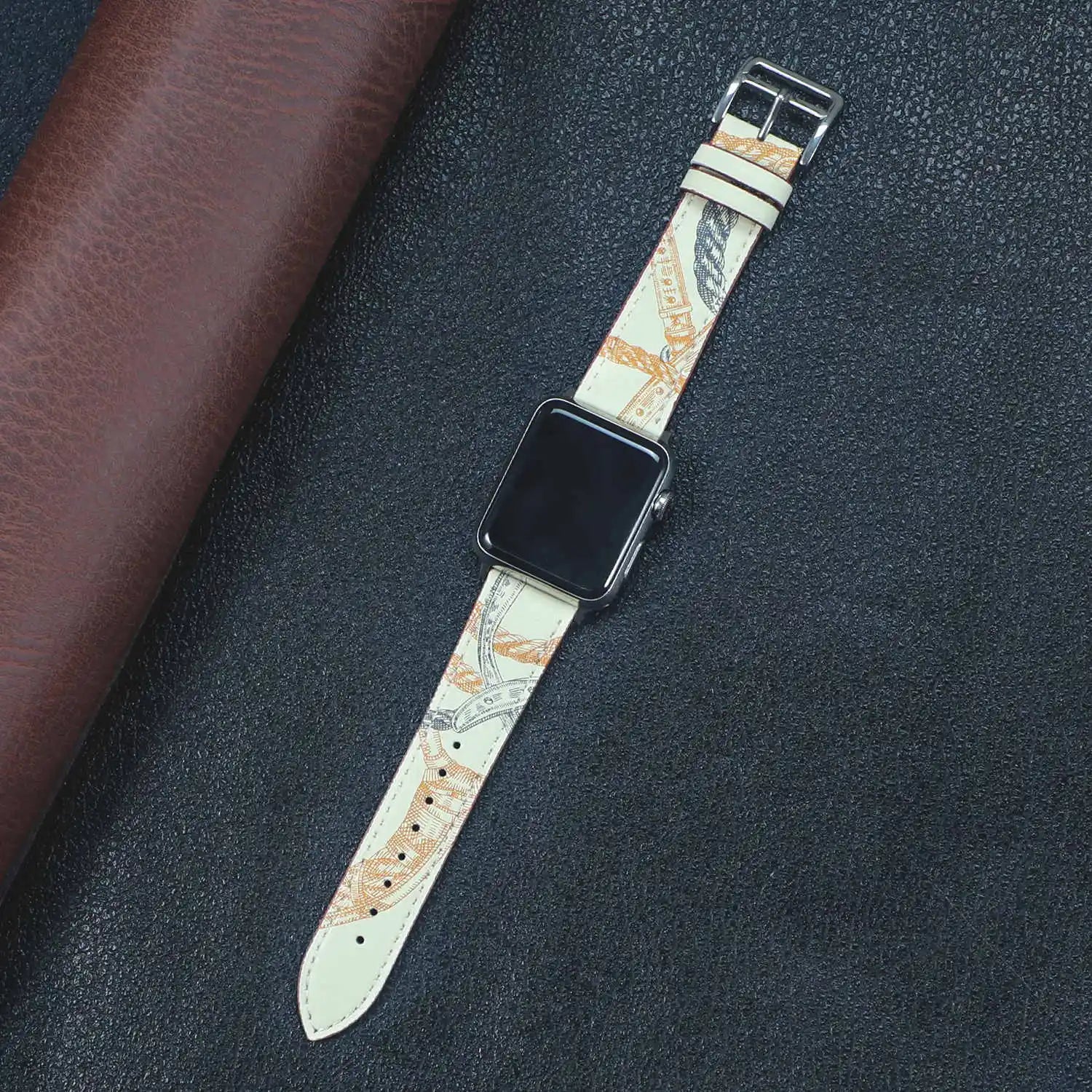 Apple Watch Fabric Band featuring stylish design and metal buckle clasp on a textured background.