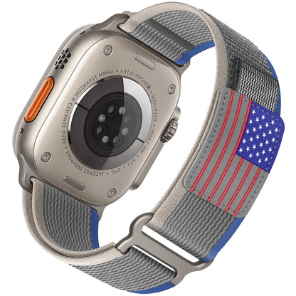 Apple Watch with rugged nylon band featuring American flag design, perfect for outdoor activities and adventure.