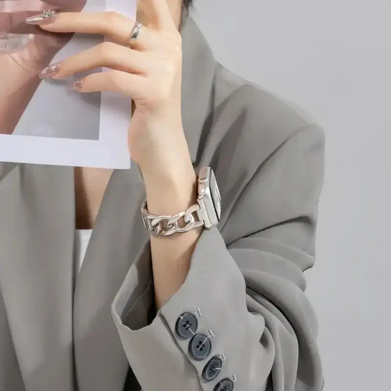 Silver Apple Watch chain bracelet worn on wrist
