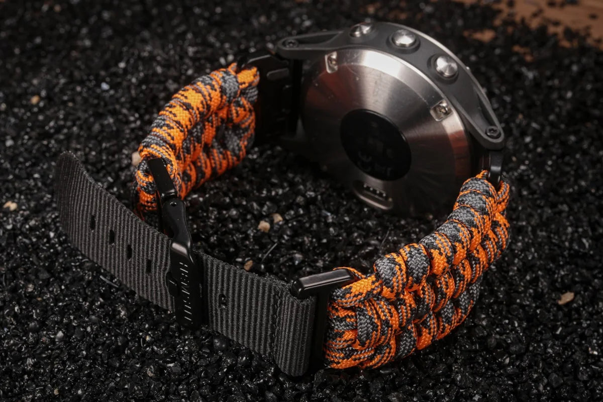 Garmin QuickFit Braided Paracord Band orange and gray braided band shown on a watch