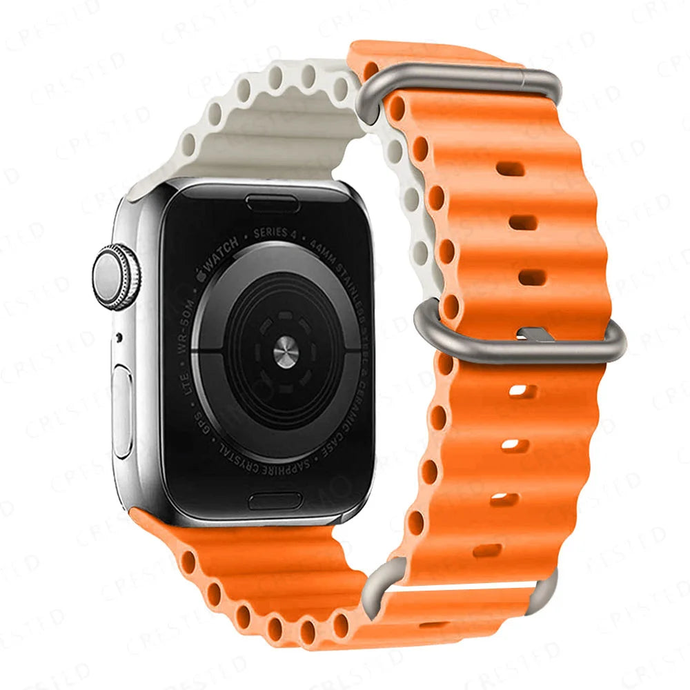 Apple Watch with orange and white silicone strap, waterproof and breathable for active lifestyles.