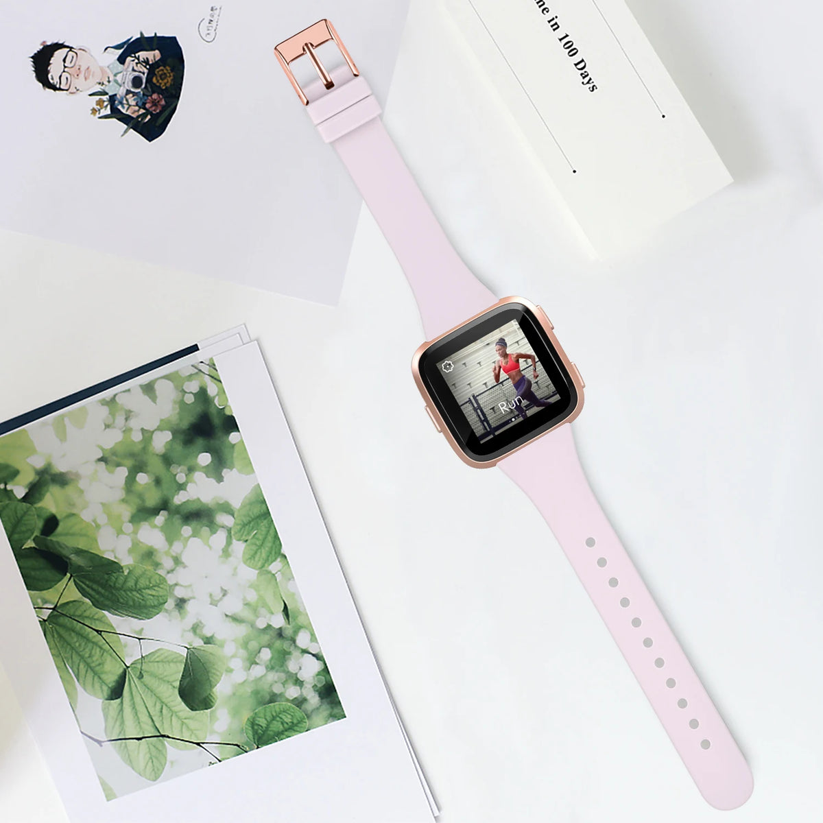Fitbit Versa 2 Slim Silicone Buckle Band - Lilac strap and watch laid flat