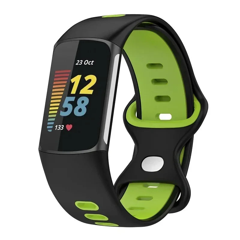 Fitbit Charge 5 with soft silicone strap in black and green, perfect for sports and everyday wear.