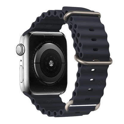 Apple Watch with navy silicone strap, waterproof and breathable, designed for comfort and active lifestyles.