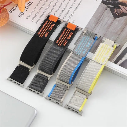 Apple Watch Nylon Bands - Rugged Trail Loop in black, gray, blue, and yellow, showcasing durability for active lifestyles.