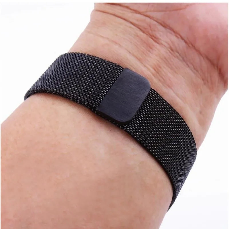 Garmin Metal Milanese Band on wrist, featuring a magnetic closure for a secure fit and stylish design.