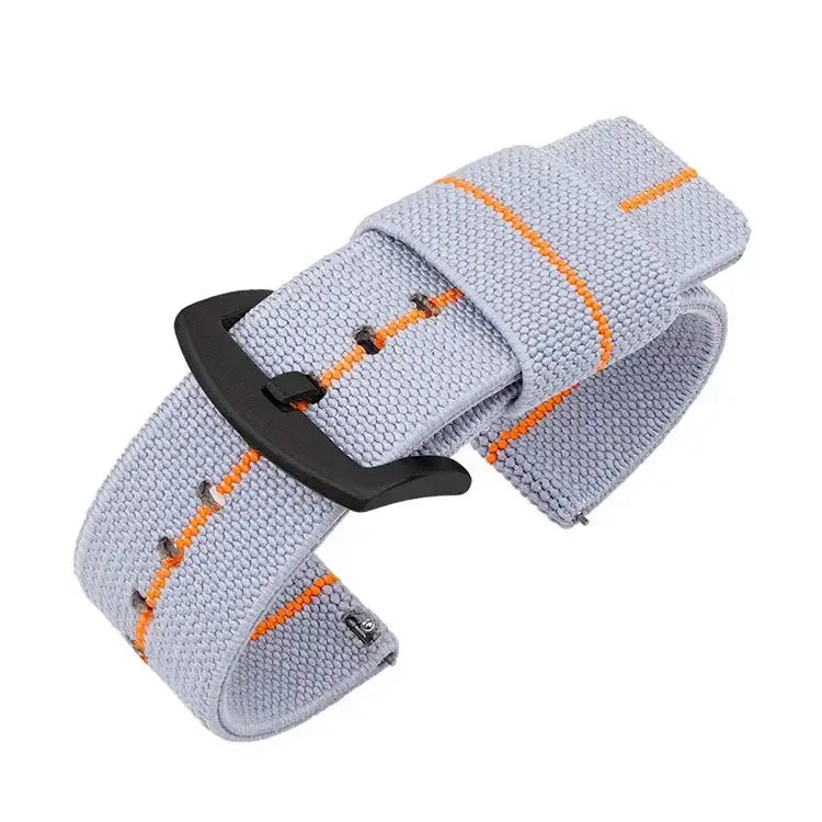 Lightweight nylon Suunto watch band in light gray with orange stripes, designed for ultimate comfort and ease of wear.