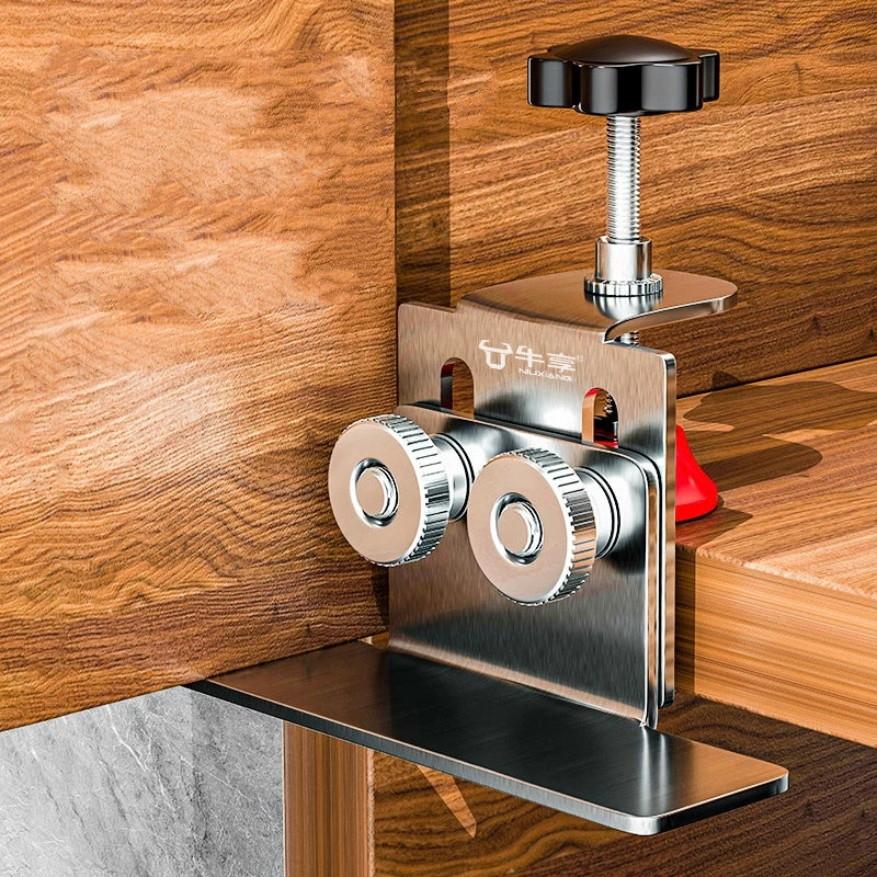 Stainless steel cabinet door mounting jig clamped to a cabinet