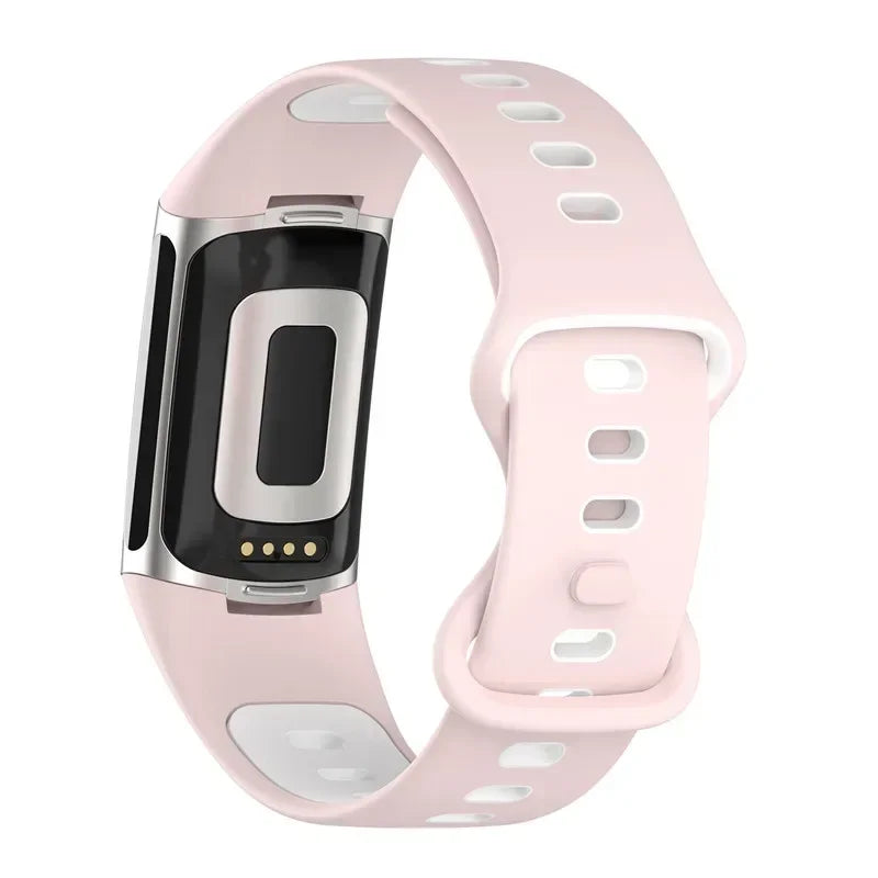 Fitbit Charge 5 soft silicone strap in pink, ideal for comfort and style in smartwatch bands.