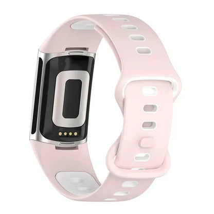 Fitbit Charge 5 soft silicone strap in pink, ideal for comfort and style in smartwatch bands.