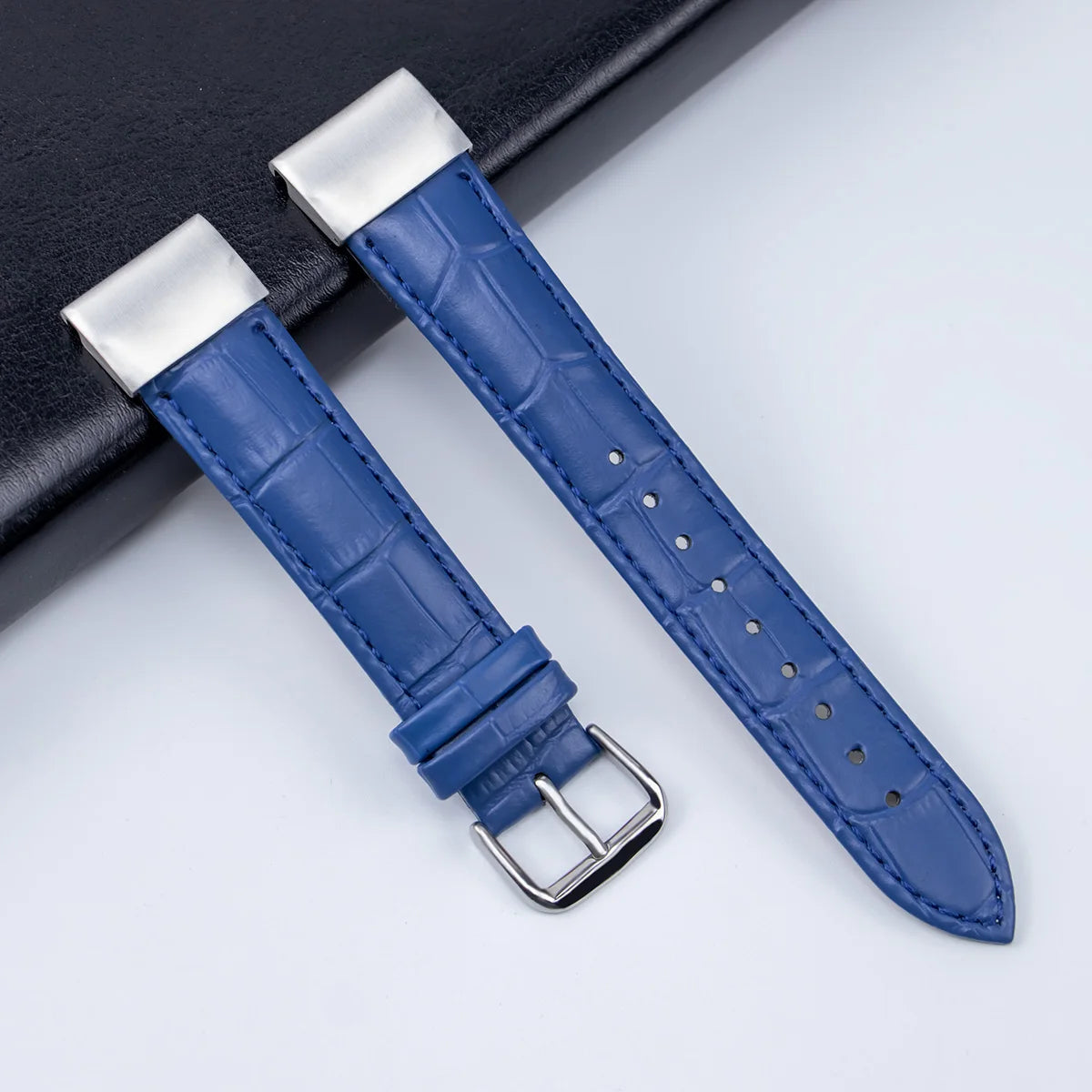Premium blue leather strap with silver buckle for Garmin smartwatch replacement band.