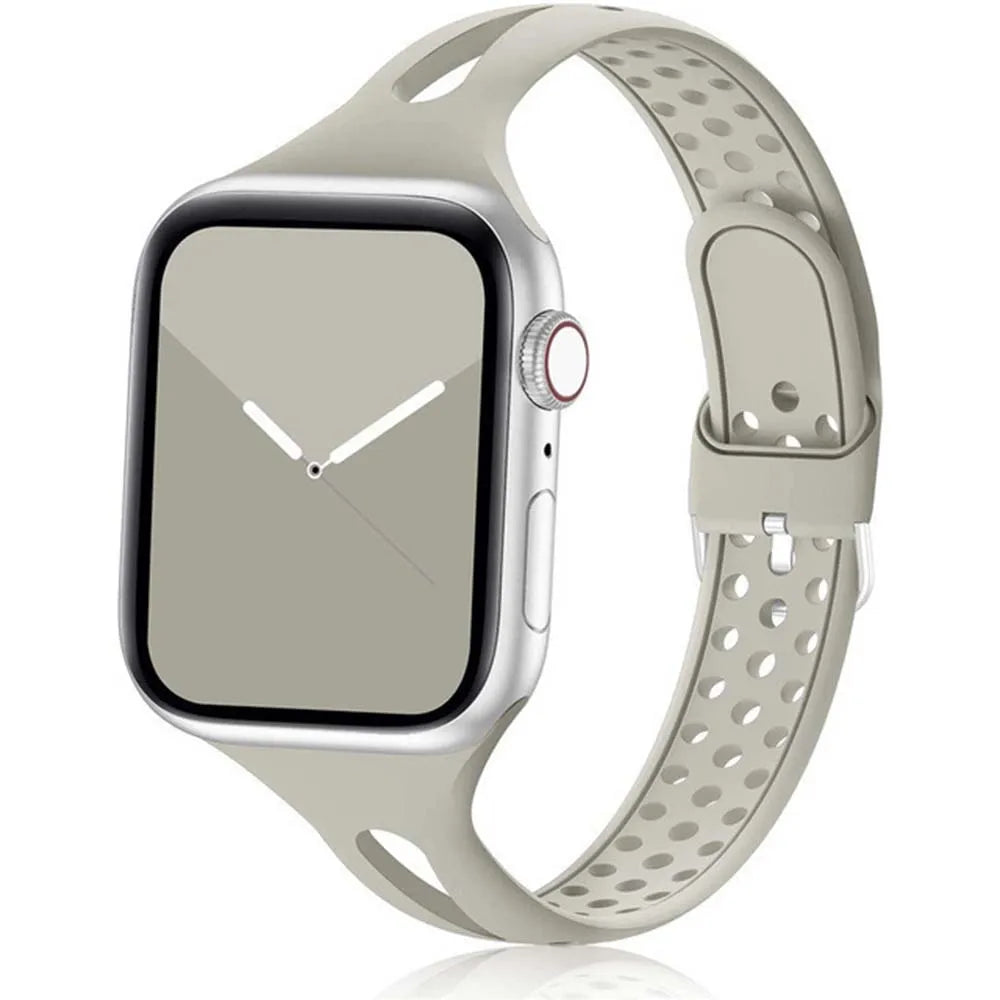 Apple Watch with a soft, flexible silicone strap featuring a breathable design and stylish gray color.