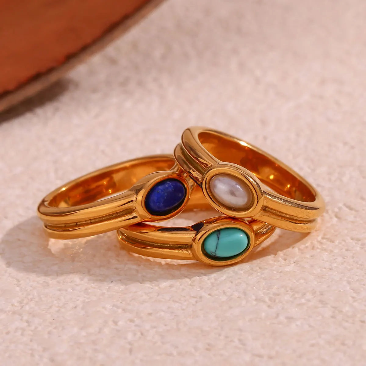 Paved lapis lazuli ring, gold-tone stainless steel