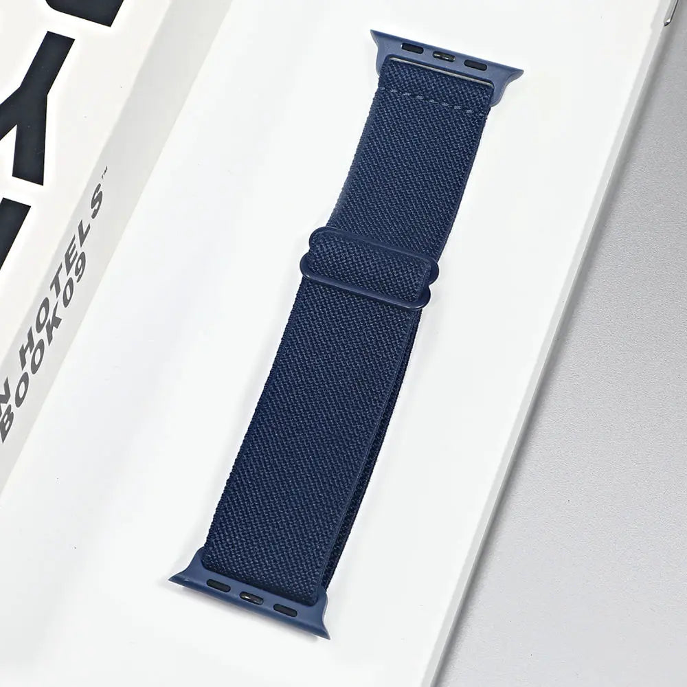 Navy nylon sport loop strap for Apple Watch, breathable and comfortable for workouts and daily wear.