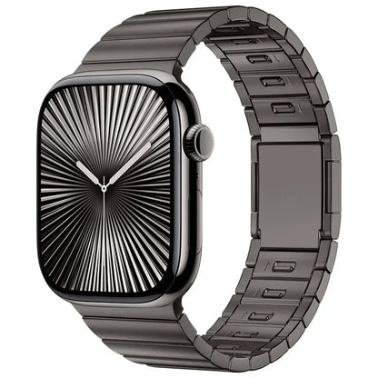Apple Watch with stainless steel band and magnetic buckle strap, showcasing its sleek and modern design.