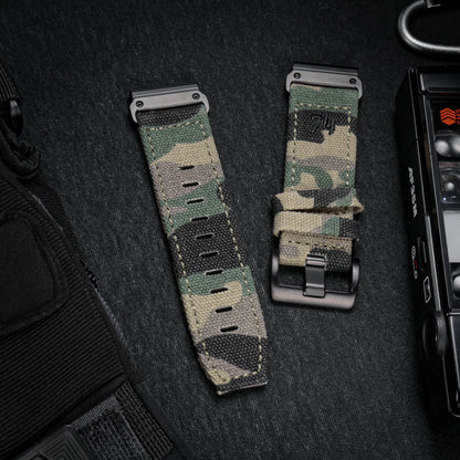 Garmin rugged nylon sport band in camouflage design, durable strap for smartwatches, suitable for an active lifestyle.