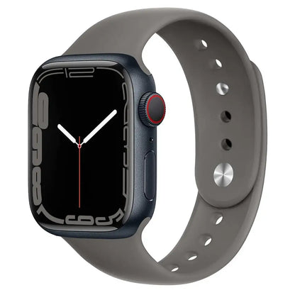 Apple Watch with silicone strap in gray, showcasing a sleek design and comfortable fit for everyday wear.